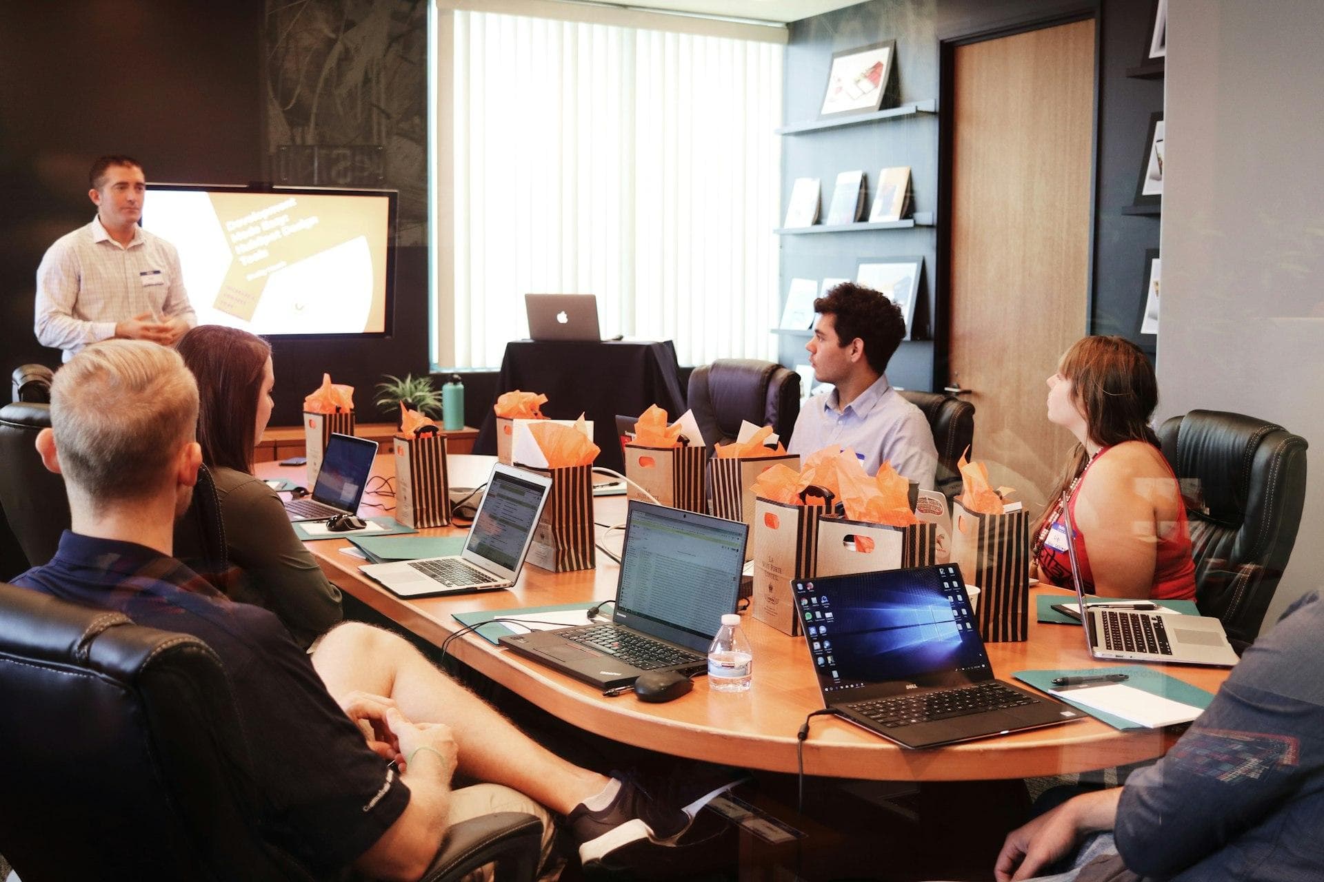 Engineering team in a video meeting reviewing enclosure specifications